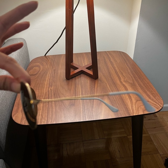 Ray bans sunglasses! Cool goldtoned transitional frames. Condition is excellent - Picture 3 of 4